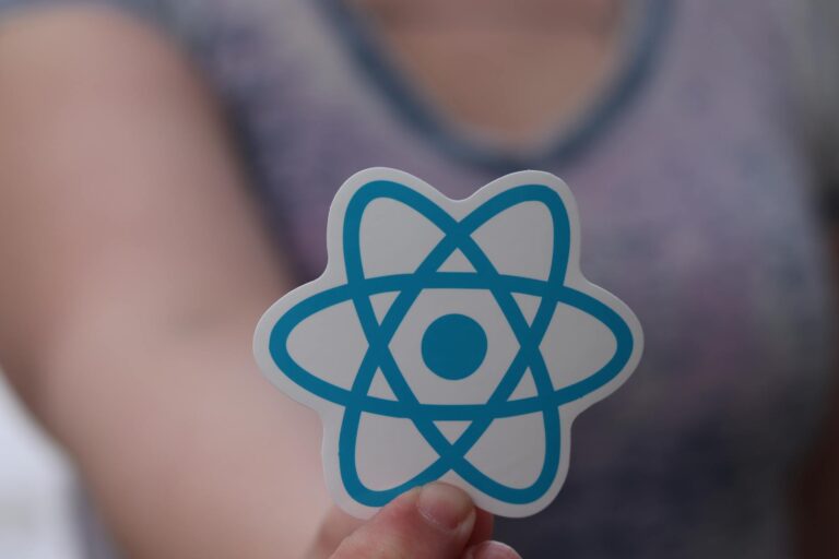 hand holding react sticker